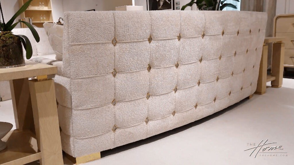 back of chenille sofa with tufted pattern, inlay of mother of pearl and brass accents