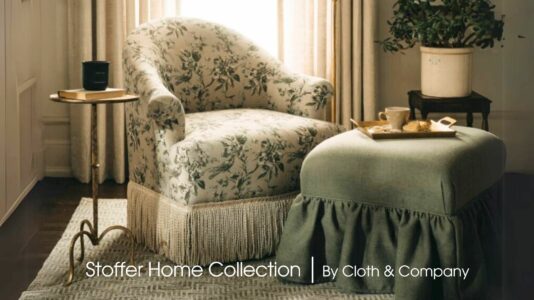 image of cozy cream colored upholstered chair with bullion fringe and green ottoman with ruffled skirt