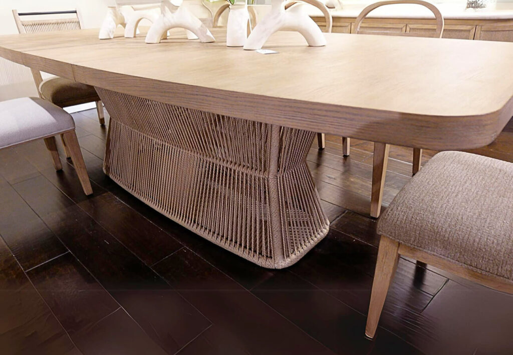 image of dining table with recessed modern base made from Danish cord, chairs