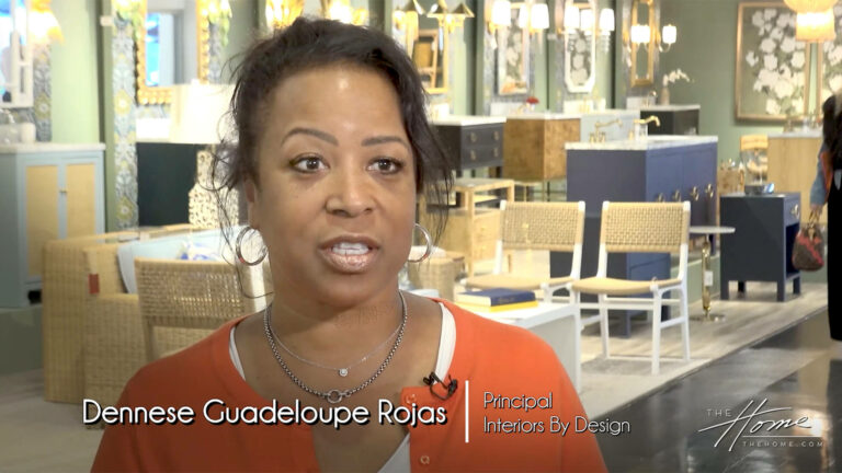 Image: black woman in orange sweater in showroom of home furnishings. text: Dennese Guadeloupe Rojas, Principal, Interiors By Design